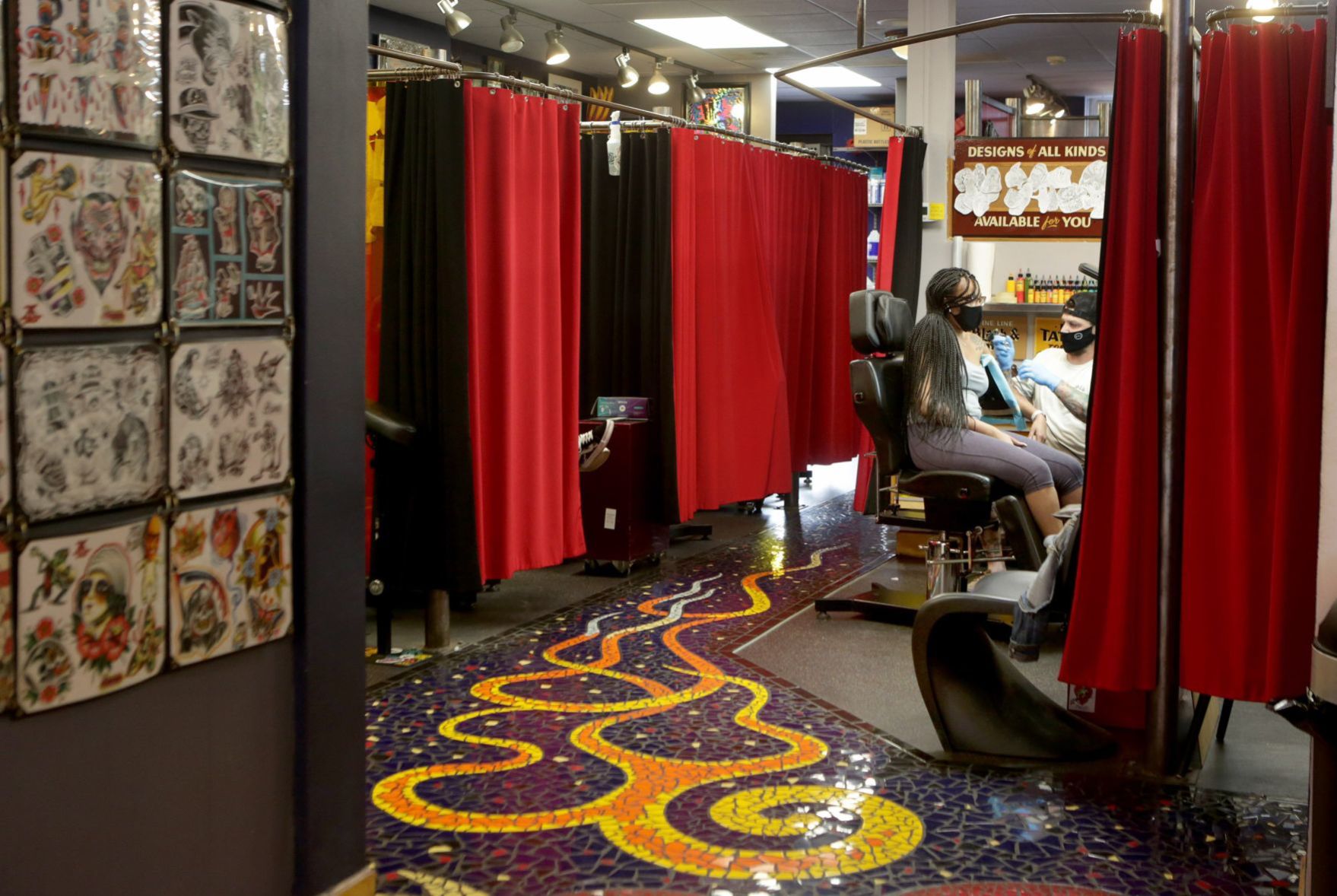 Iron Age Tattoo and Piercing Studio reopens